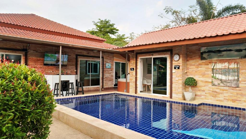Nong Prue Villa | Luxury 6BHK Villa with Private Pool in Pattaya by - OzyStays