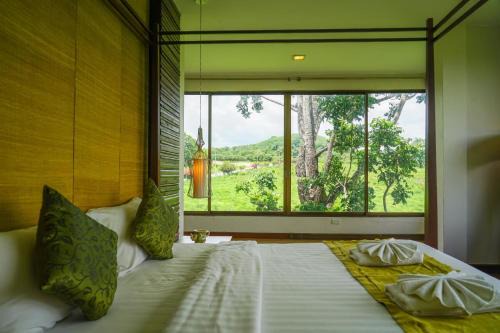 โรงแรมวิลลา พาราดี in Ban Khanong Phra Tai