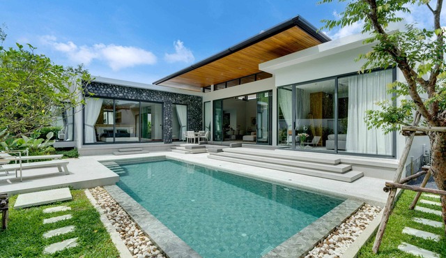 3-bedroom private villa with pool, garden, and spacious living room by Continent in Tambon Si Sunthon