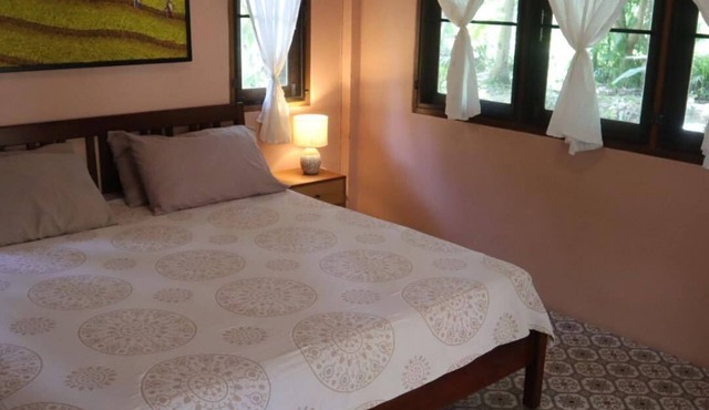 Cozy cottage surrounded by nature next to the beach. in Chumphon