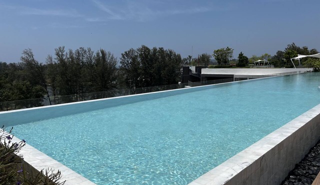 Skypark Laguna 1BR, Rooftop Pool, Walk to Bang Tao & Boat Avenue in Choeng Thale