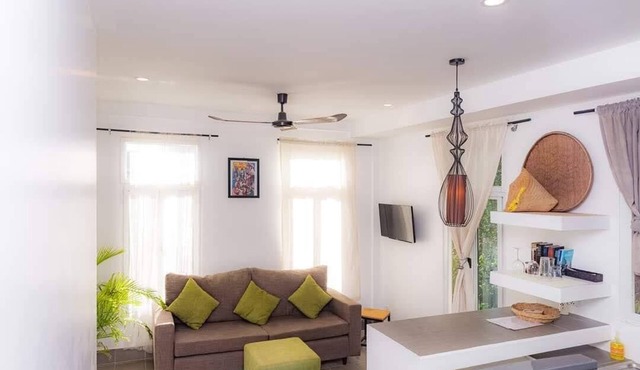 Tree-Shaded Bungalows Near Town with Kitchens & Scenic River Walks in Krong Siem Reap