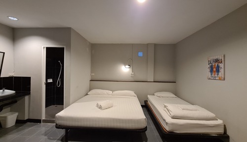 Triple 3 Single Beds with Private Bathroom