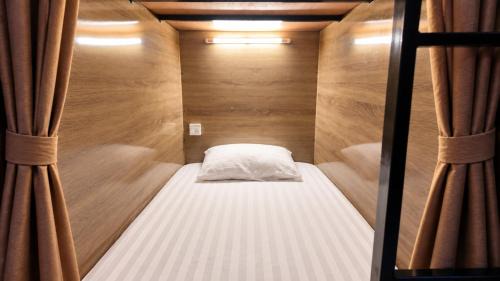 Single Bed in Dormitory Room