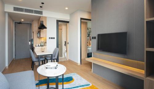 Two-Bedroom Suite with One King Bed, Two Single Beds and Balcony