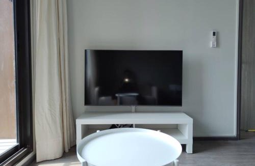 Talat Phlu Apartment | Charming Bangkok Apartment with City, Pool, and River Views