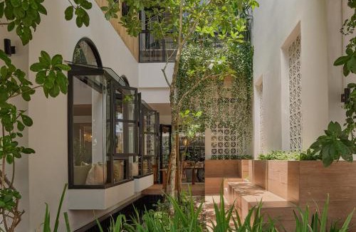 Chanthanimit Hotel | The Motifs Eco Hotel - SHA Extra Plus
