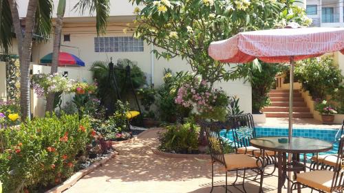 Jomtien Apartment | BUTTERFLY GARDEN BOUTIQUE RESIDENCES Apts and villas, A Lifestyle Destination Ex Lg 1-3 bedroom units , Full kitchen, 2 Full bathrooms, Rain shower, Spa bath, FREE BBQ, Free fast fiber optic WIFI, Staff 24-7